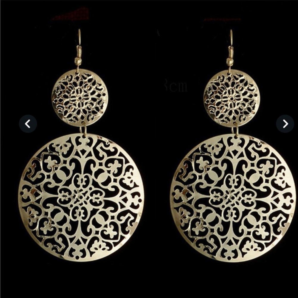 Light weight silver dangle earrings. New in package